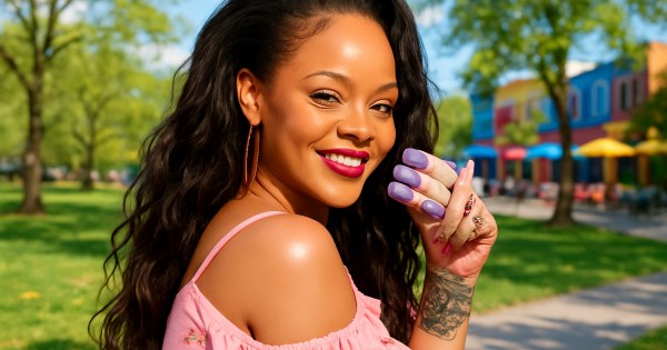 Woman smiling representing Rihanna as your perfect celebrity mate result