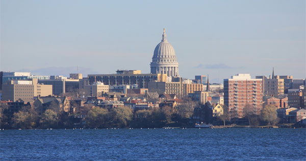 Scenic view of Madison Wisconsin skyline reflecting on Lake Monona
